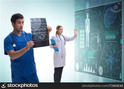 Doctor in telemedicine concept looking at x-ray image