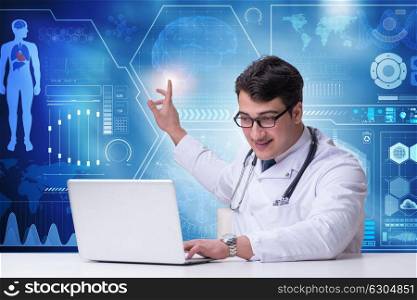 Doctor in telemedicine concept pressing button