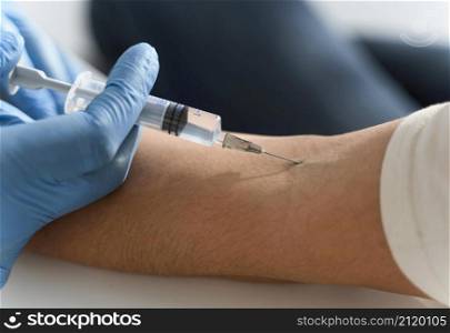 doctor injecting vaccine woman s arm