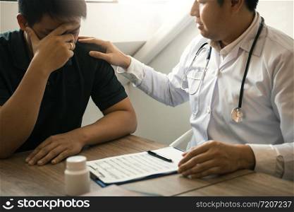 Doctor is comforting the patient after notifying the patient about the outcomes of treatment.