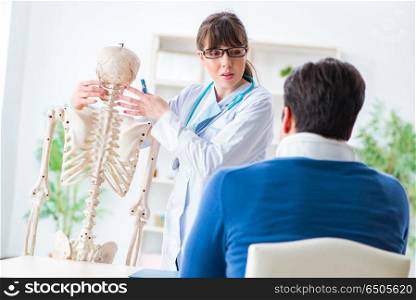 Doctor is explaining to patient with neck injury