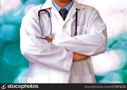 Doctor lab white coat over bokeh blue background