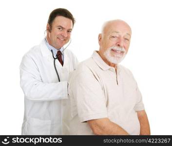 Doctor listening to a senior man&rsquo;s lungs. Both smiling at camera. Isolated.