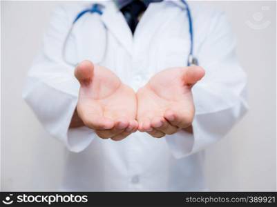 Doctor lman hand with something isolated on white background.