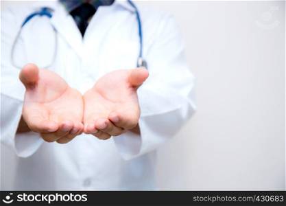 Doctor lman hand with something isolated on white background.