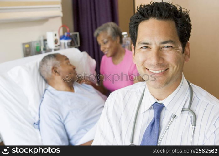 Doctor Looking Cheerful In Hospital Room