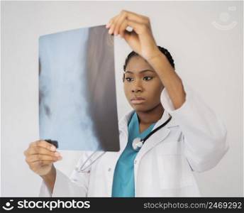 doctor looking radiography