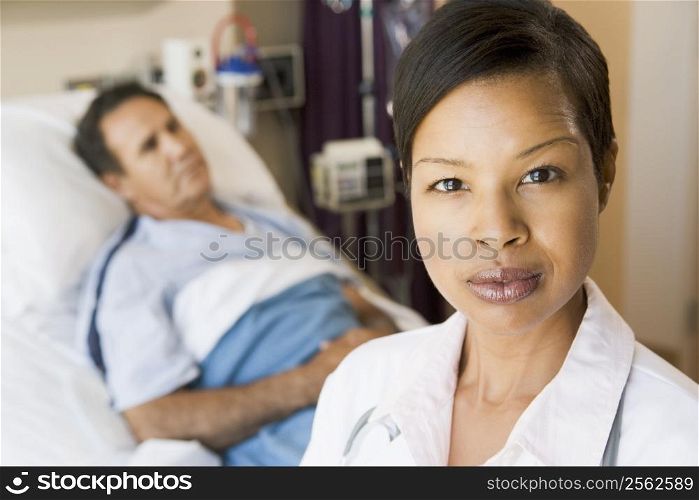 Doctor Looking Serious,Standing In Hospital Room