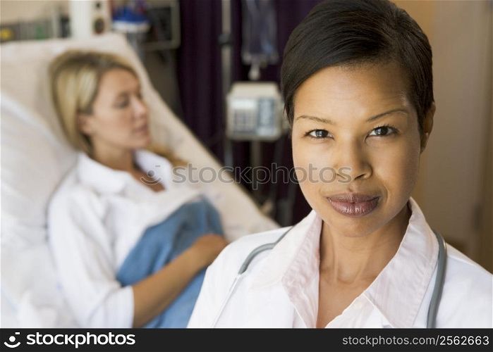 Doctor Looking Serious,Standing In Hospital Room