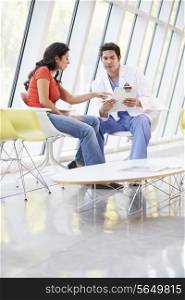 Doctor Offering Counselling To Depressed Woman