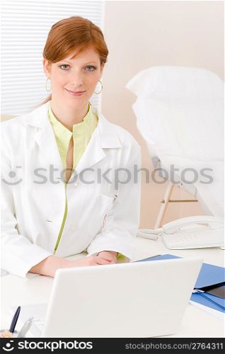 Doctor office - portrait female physician in front of computer