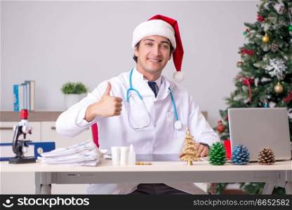 Doctor on the shift on christmas eve