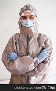 Doctor or lab technician scientist in PPE Personal Protective Equipment. Female Doctor in PPE Personal Protective Equipment