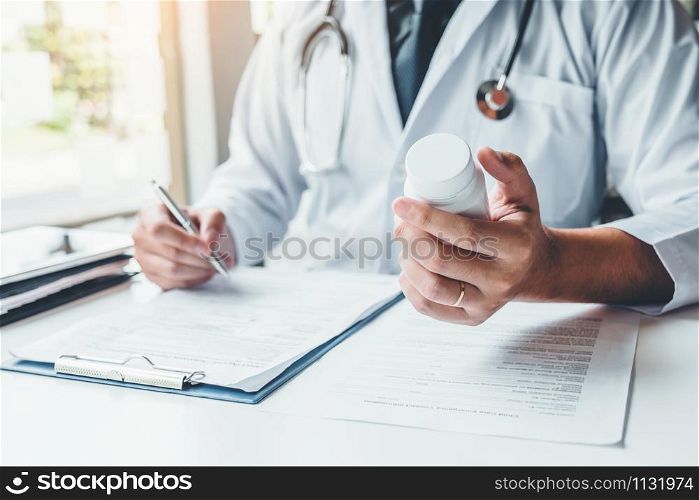 Doctor or physician recommend pills medical prescription to Patient