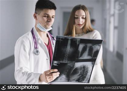 doctor patient watching x ray