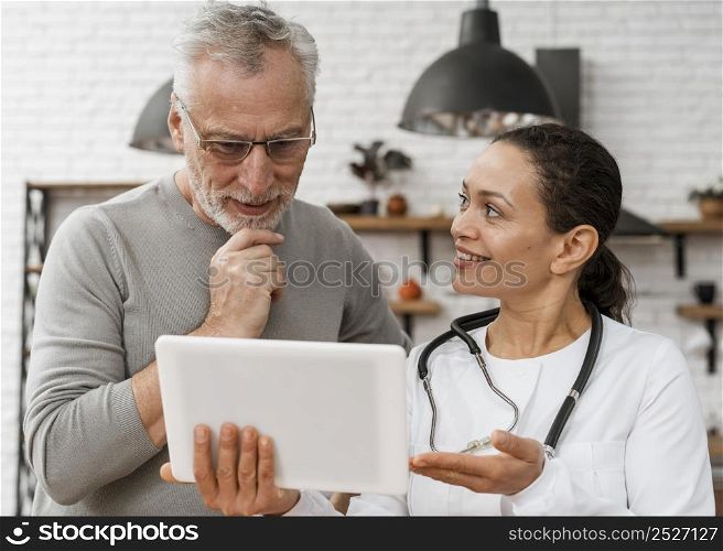 doctor posing with her patient
