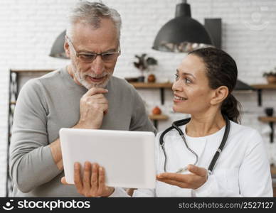 doctor posing with her patient