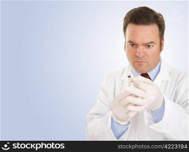 Doctor preparing a syringe to give a shot. Blue background with room for text.