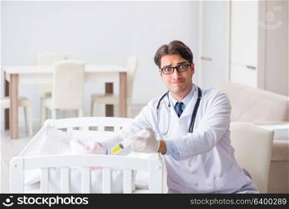 Doctor preparing for baby vaccination