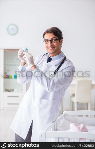 Doctor preparing for baby vaccination