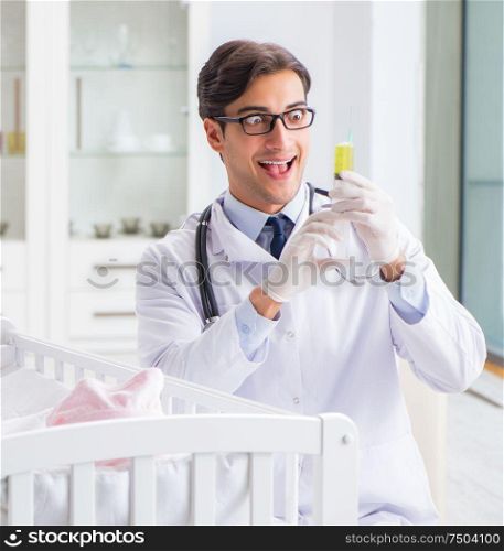 Doctor preparing for baby vaccination. The doctor preparing for baby vaccination