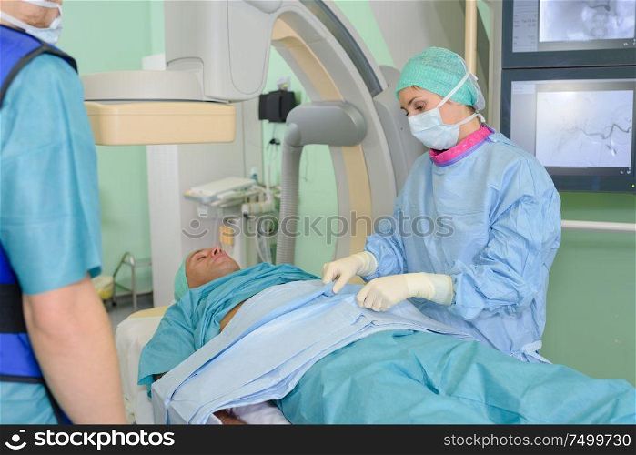 Doctor preparing for surgery on patient