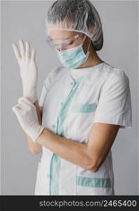 doctor putting surgical gloves 2