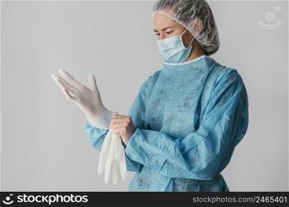 doctor putting surgical gloves 3