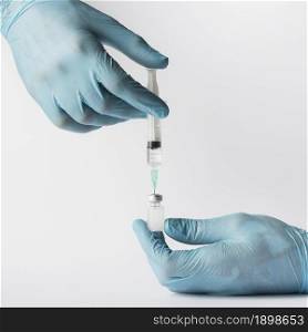 doctor putting vaccine syringe. Resolution and high quality beautiful photo. doctor putting vaccine syringe. High quality beautiful photo concept