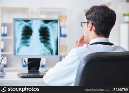 Doctor radiologist looking at x-ray images