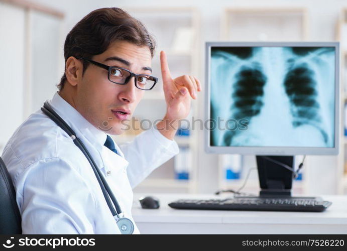 Doctor radiologist looking at x-ray images. The doctor radiologist looking at x-ray images