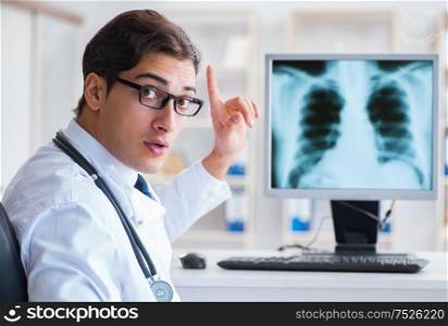 Doctor radiologist looking at x-ray images. The doctor radiologist looking at x-ray images