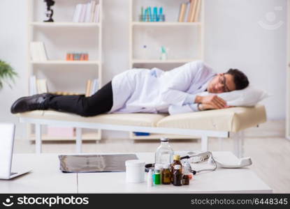 Doctor relaxing after complex surgery in hospital