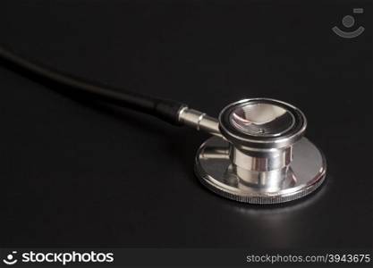Doctor&rsquo;s stethoscope on black background