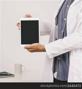 doctor s hands holding ipad