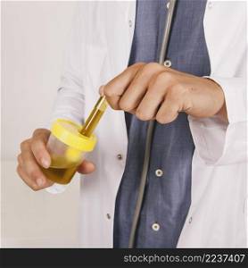 doctor s hands holding urine test