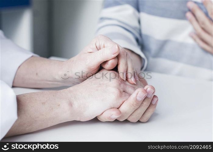 doctor s hands tending patient