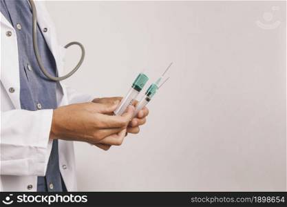 doctor s hands with several syringes. Resolution and high quality beautiful photo. doctor s hands with several syringes. High quality beautiful photo concept