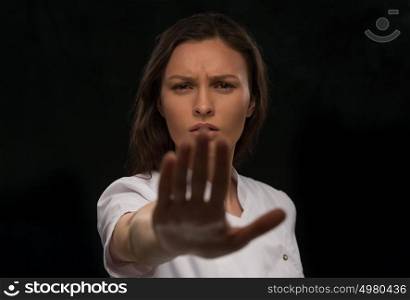 Doctor saying and showing stop gesture
