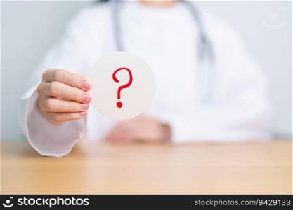 Doctor show Questions Mark ( ? ) on paper. FAQ, frequency asked questions, Answer, Information, Communication, Health, Diagnosis  and Medical concept