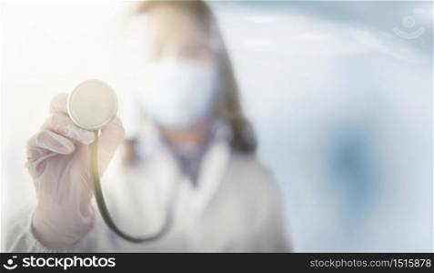Doctor showing black stethoscope in hand , concept viral pandemic covid-19.