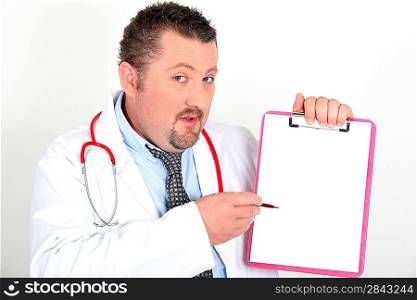 Doctor showing notepad, studio shot