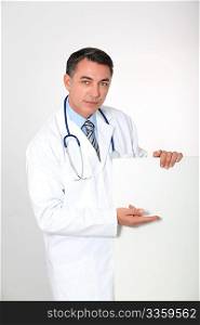 Doctor showing white board