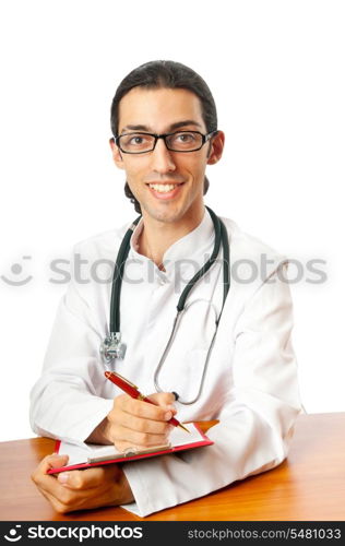 Doctor sitting at the desk on white