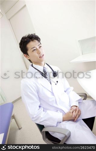 Doctor sitting in his office