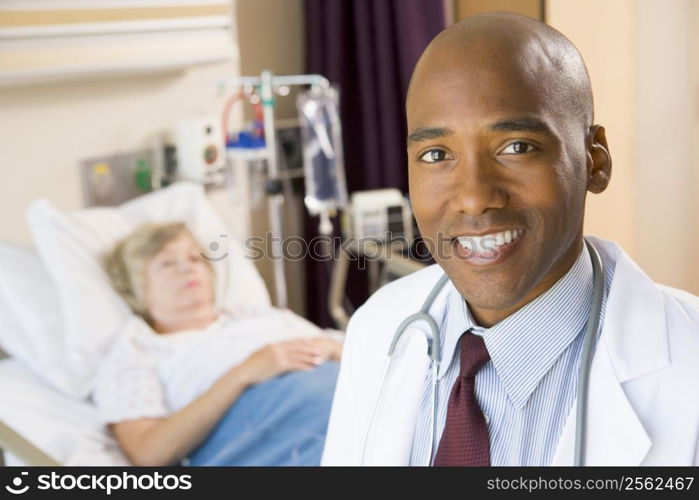 Doctor Smiling In Patients Room