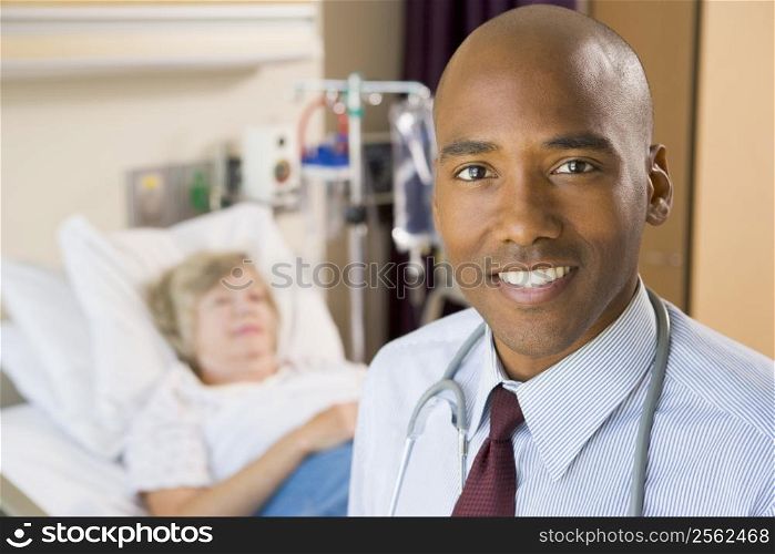 Doctor Smiling,Standing In Hospital Room