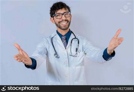 Doctor smiling with open arms welcoming. Friendly doctor hugging the camera. Medical friendship concept