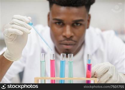 doctor student male at lab coat in lab