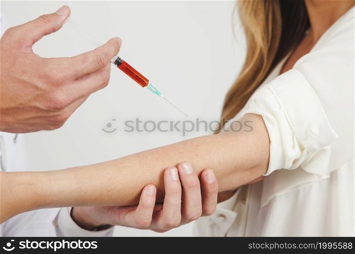 doctor taking blood
